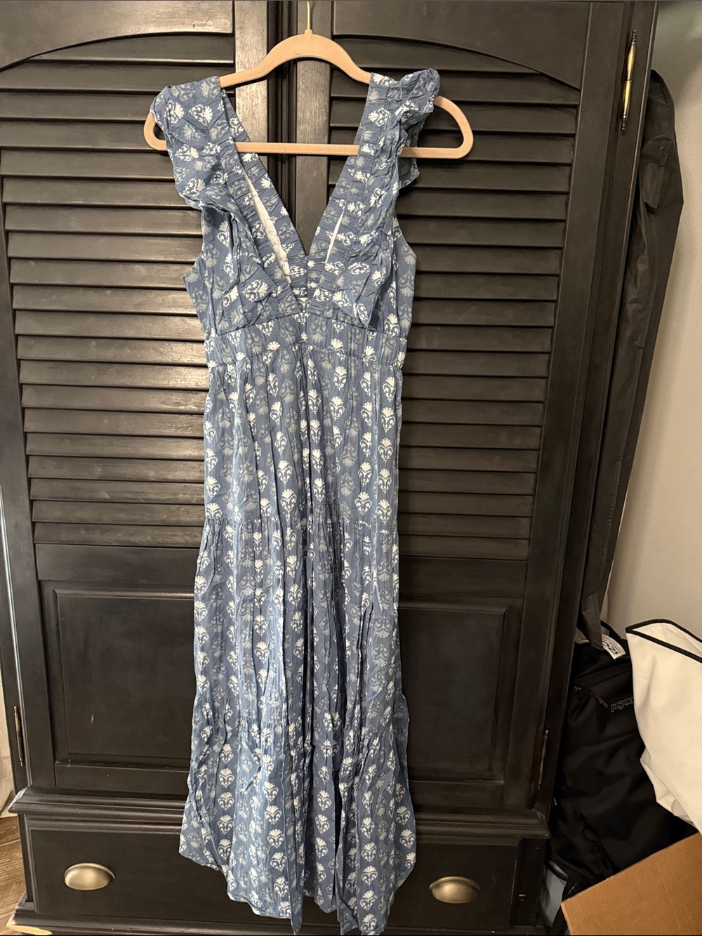 Madison Matthew’s Sleeveless Blue Floral Maxi Dress with Ruffle Shoulders